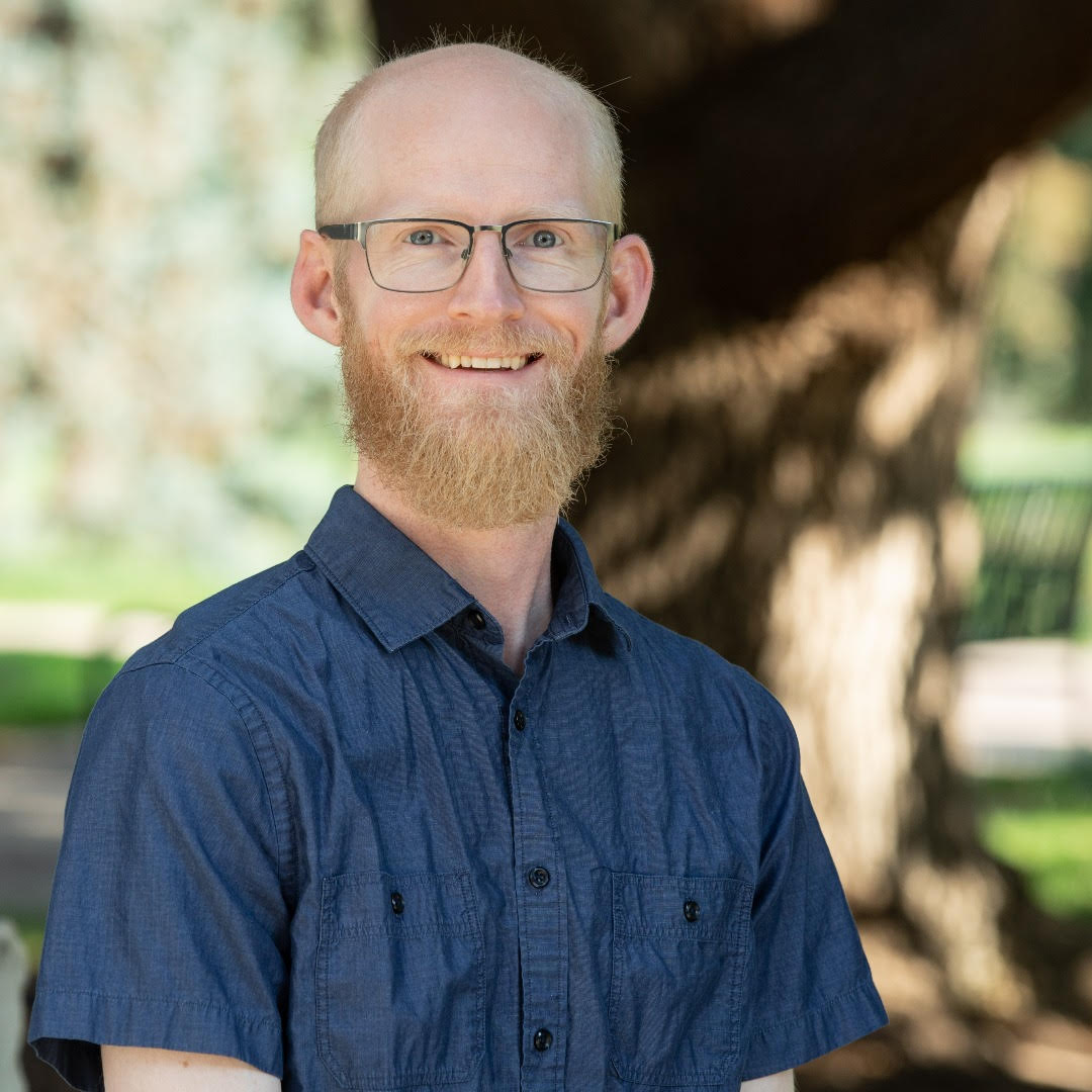 Professional headshot of Brooks Christensen